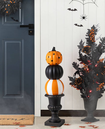 orange and back pumpkin topiary. stacked pumpkins for front porch.orange and back pumpkin topiary. stacked pumpkins for front porch.