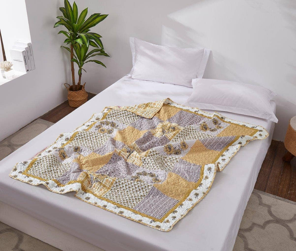patchwork gray and yellow sunflower quilt