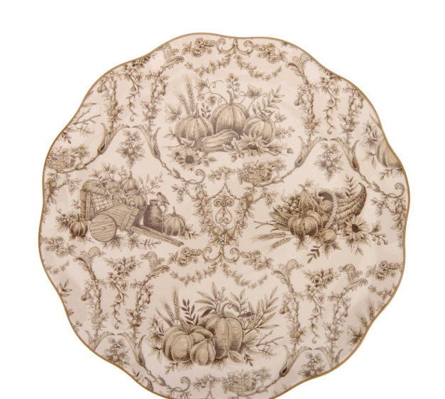 Elegant vintage-style dinnerware set with intricate botanical patterns in neutral tones