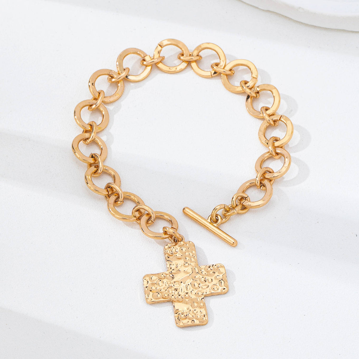 gold hammered cross toggle bracelet
