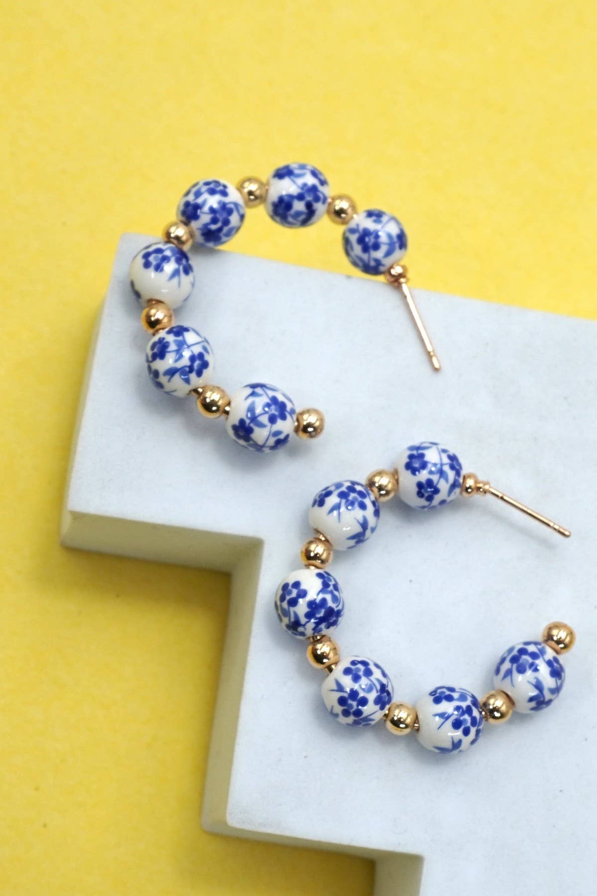 Hoop earrings with white and blue toile patterned beads