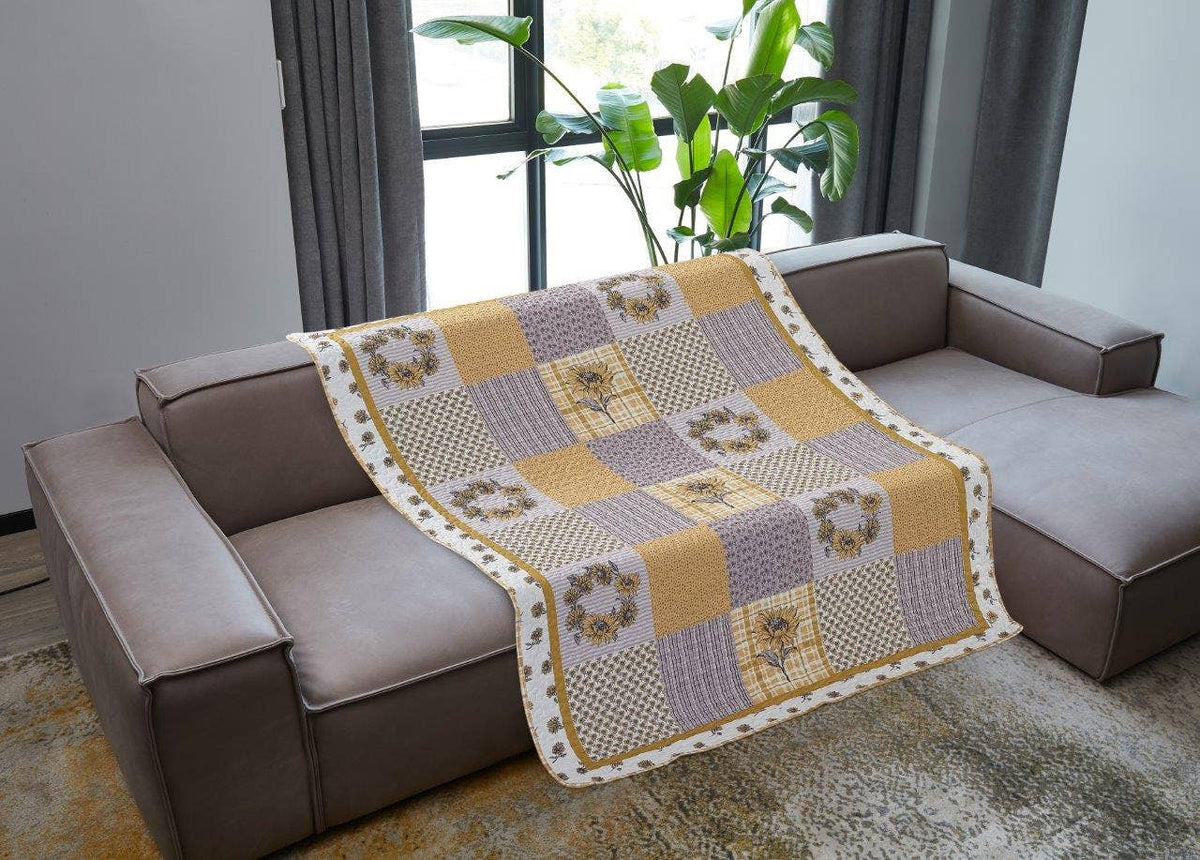 patchwork gray and yellow sunflower quilt