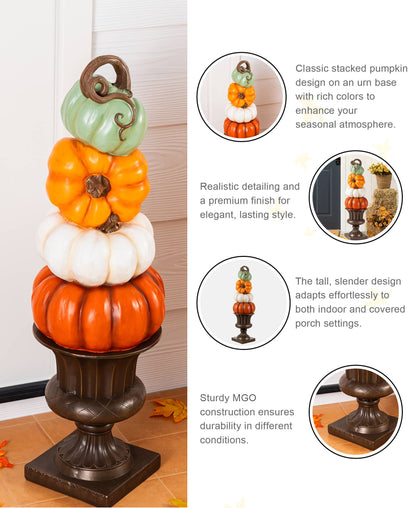 Stack of orange, white, and turquoise pumpkins on an urn for front porch