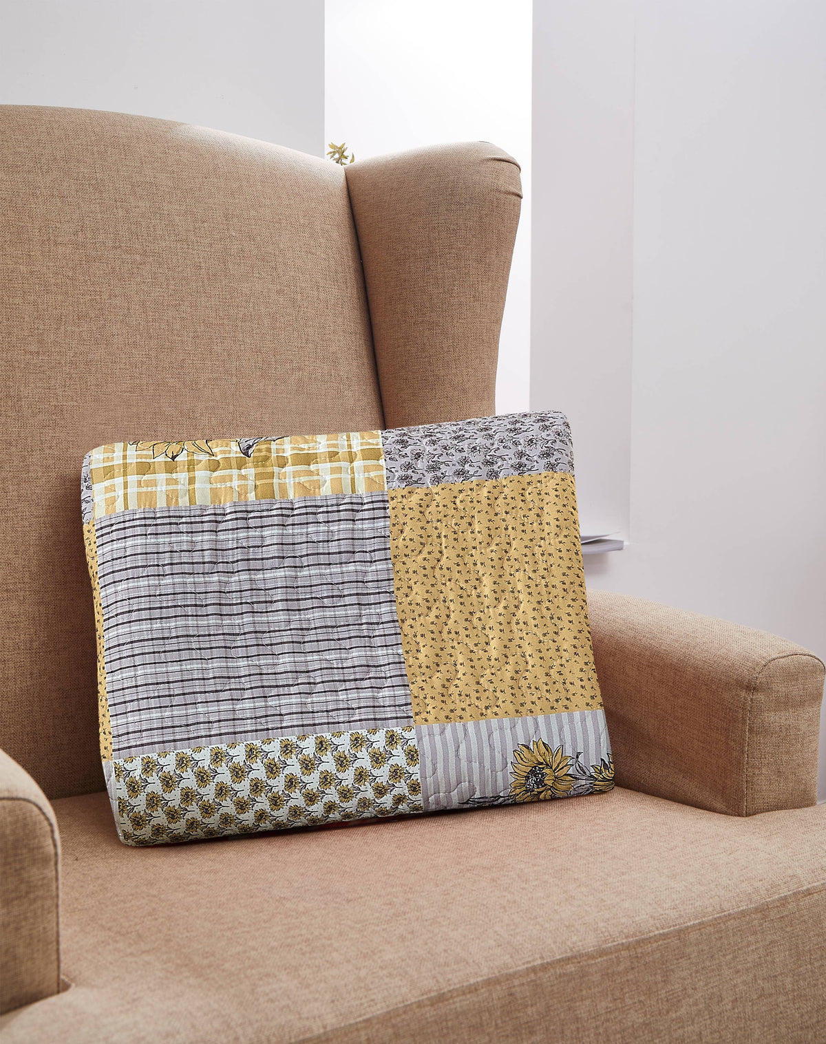 patchwork gray and yellow sunflower quilt