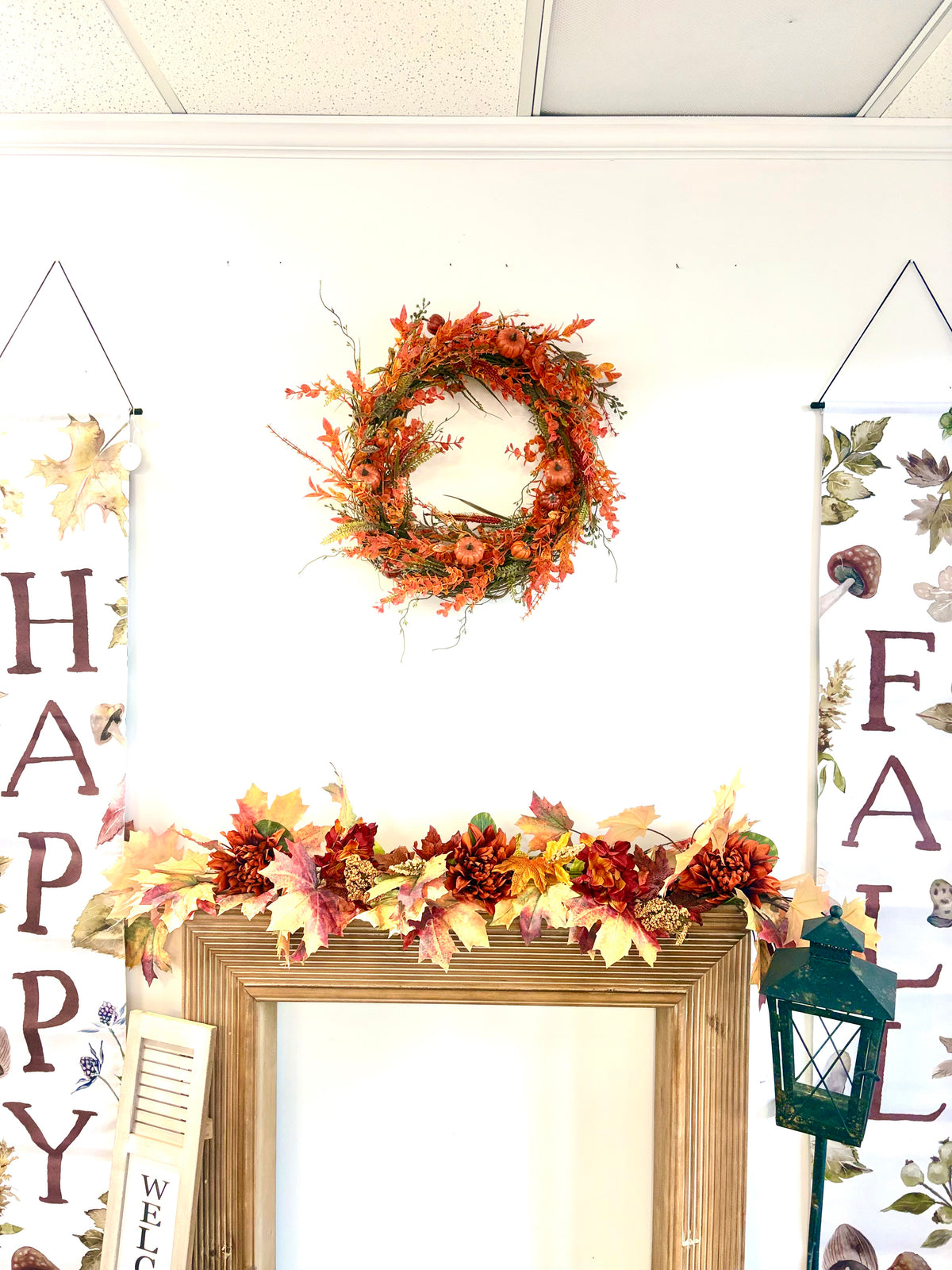 18" round wreath with orange fall foliage and orange pumpkins